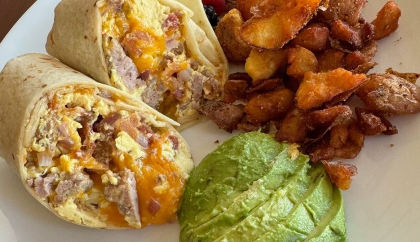 breakfast burrito with potatoes and avocado